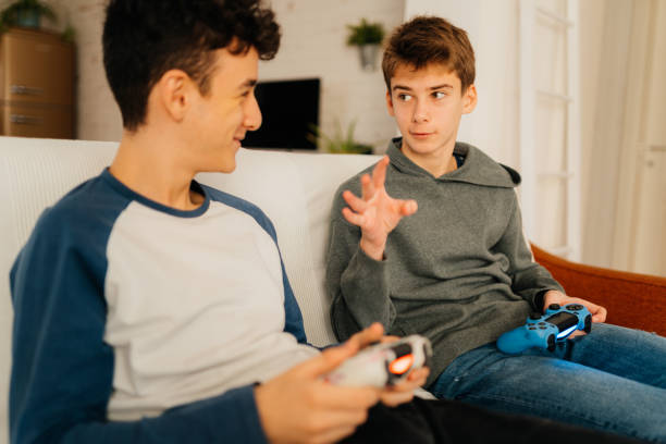istock Friends playing video games 2167450804