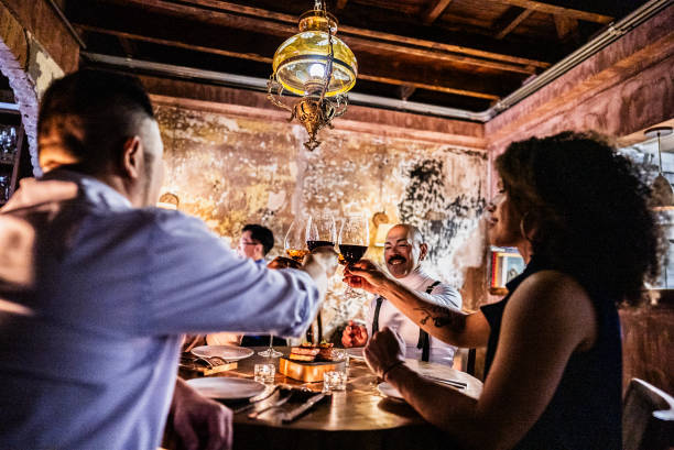 istock Friends toasting at a restaurant 2167451827