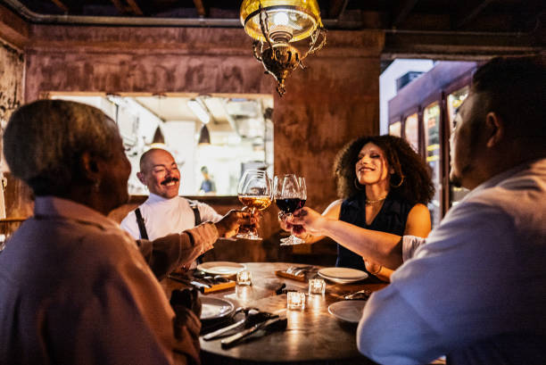 istock Friends toasting at a restaurant 2167451831