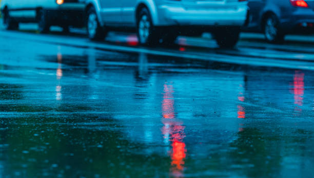 istock Cars on wet asphalt. It's raining outside. 2167451855