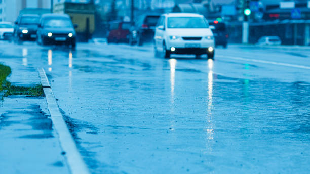 istock Cars on wet asphalt. It's raining outside. 2167451965