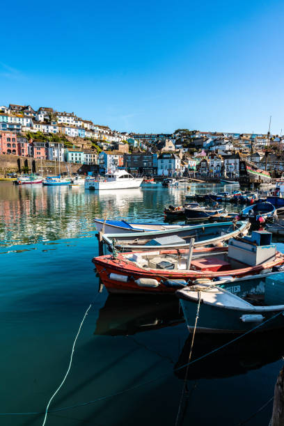 Row of boats moored in Brixham, Devon, UK