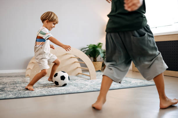 istock Playing football 2167454239