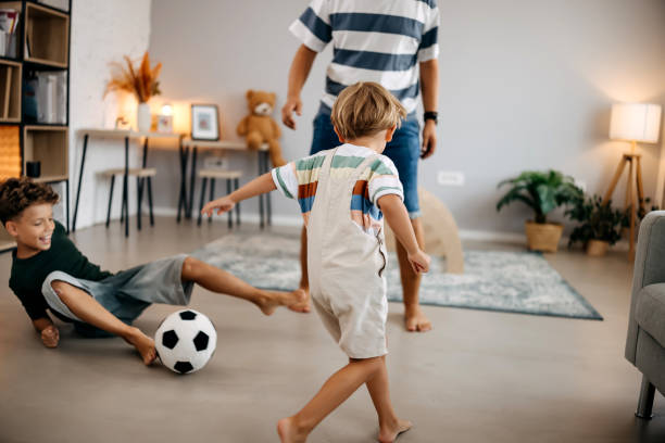 istock Playing football 2167454292
