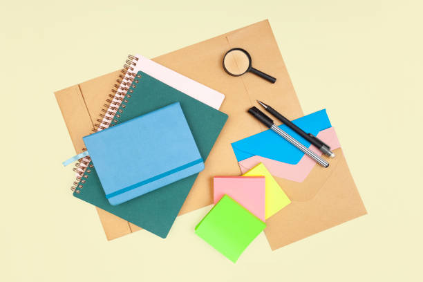 istock Office and school supply on a light yellow background. 2167454679
