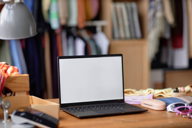 istock Laptop with Blank White Screen on Table at Thrift Store 2167456147