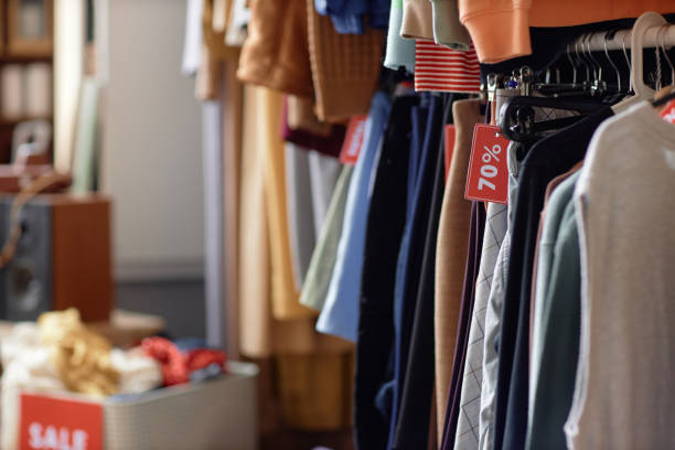 istock Clothes Hanging on Rack at Second Hand Shop 2167456160