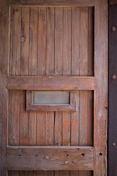 istock Rustic Wooden Door with Mail Slot 2167456245
