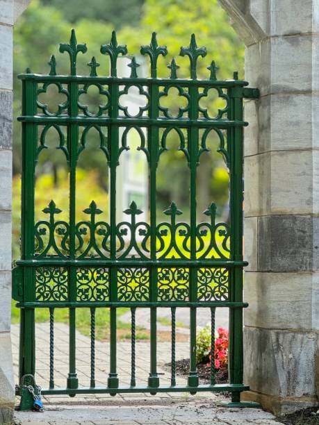 Carved pattern on the gates in the clouds. Israel. Bahai Gardens.