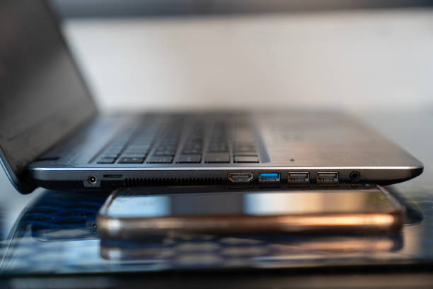 Gray open laptop.\nOn the screen connection symbol, network