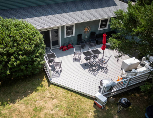 istock Drone view looking down at a deck on the back of a house 2167459320