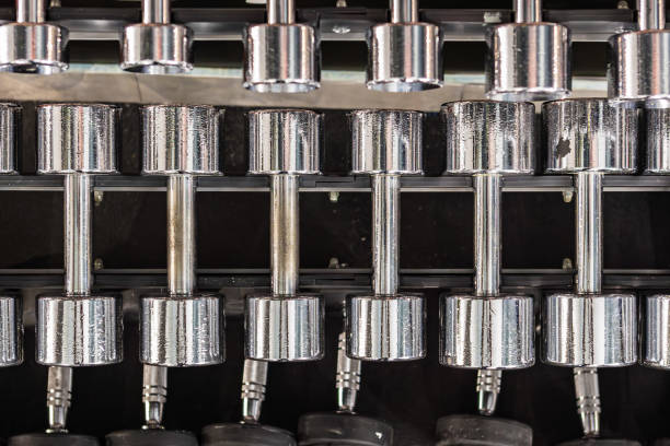 istock Fitness weights dumbbells stacked on a rack 2167459713