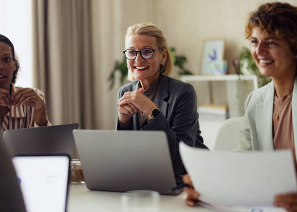 istock Diverse Group of Professionals in a Modern Office Meeting 2167466243