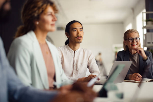 istock Diverse Business Team Engaged In Office Meeting Discussion 2167466285