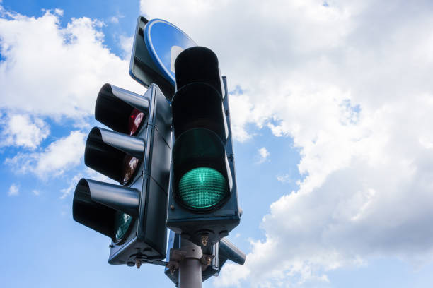 istock Traffic Light with Green Signal Against Sky 2167468851