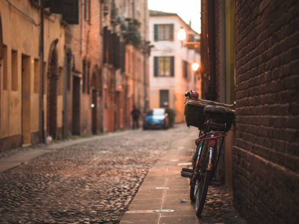 istock Bicycle leaning against the wall in a lonely alley 2167468997