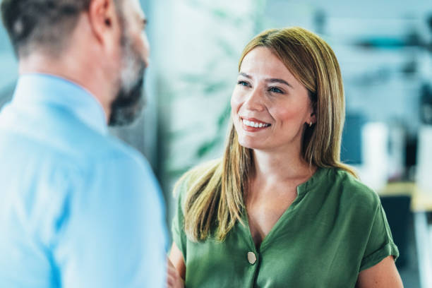 istock Business colleagues talking in the office 2167470891
