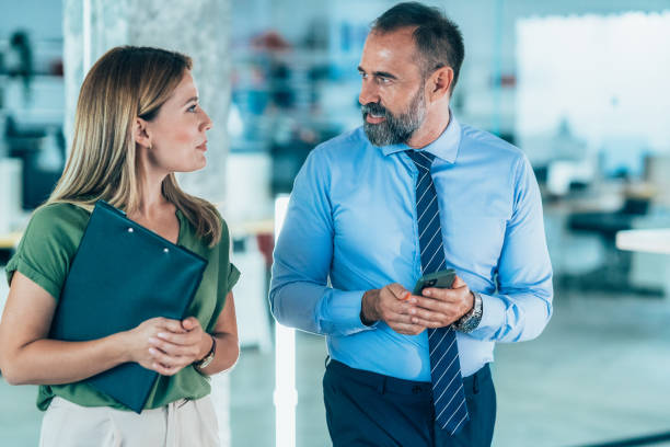 istock Business colleagues talking in the office 2167470895