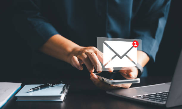 istock Client received an electronic mail containing a marketing message, seamlessly delivered through cyberspace in vast online web. electronic mail, cyberspace, client, letter, mail, marketing, message. 2167476407