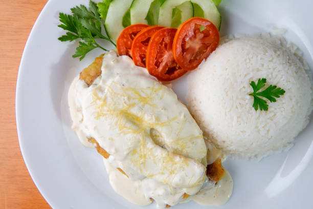 istock Delicious fish with rice and salad 2167480802