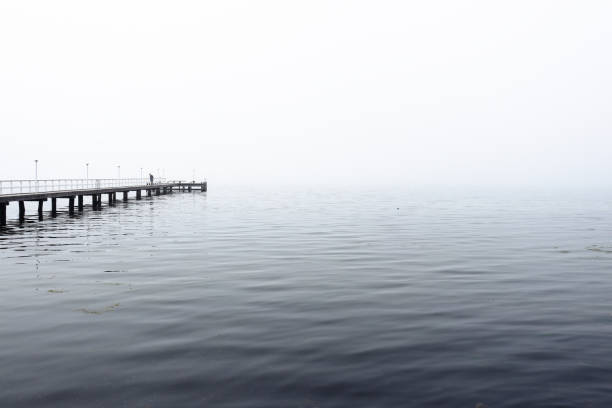 pier over the sea in fog