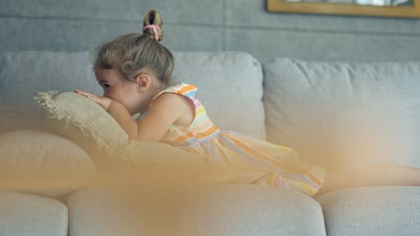 istock Happy Child Playing and Laughing on the Sofa at Home. 2167485384