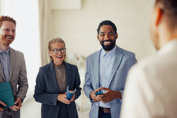 istock Colleagues Engaged in Lively Discussion During Office Meeting 2167485725