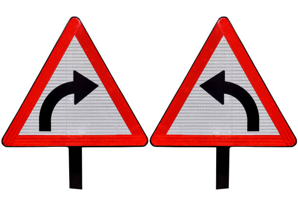 right and left hand curve, caution road sign in red triangle, isolated white,
