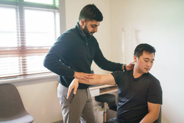 istock Neck, arm and shoulder relief, chiropractor treating a patient. 2167495533