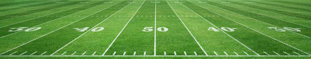 istock American football field. 2167499040