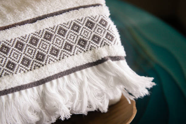 Home interior cotton towels with embroidered ethnic boho pattern in maldives luxury hotel resort villa