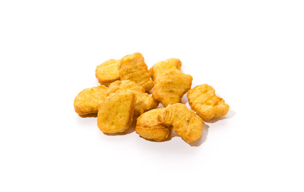 istock Crispy Chicken Nuggets on White Background - Golden Fried Fast Food Snack 2167499990
