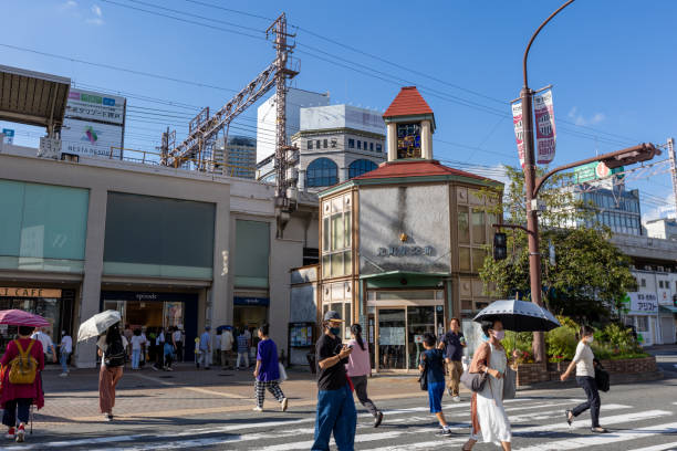 Kobe, Japan - August 18, 2022 : Pedestrians walk past Motomachi in Kobe, Japan.