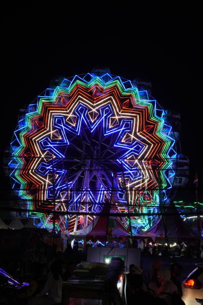 istock Ferrish wheel on a night market 2167506442