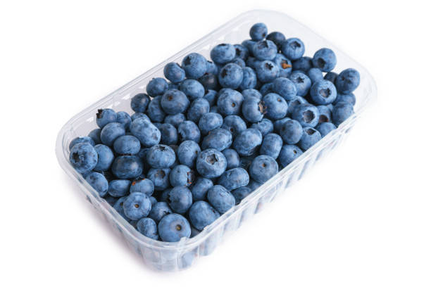 istock Fresh raw organic blueberries in transparent plastic container isolated on white background 2167508290