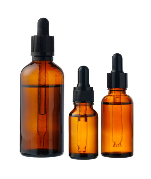 istock Amber Glass Bottles With Droppers and Jars on White Background 2167510227