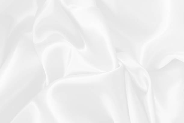 istock White fabric texture background, detail of silk or linen pattern. 2167511012