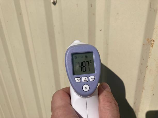 istock Measuring temperature with a non-contact thermometer 2167512271