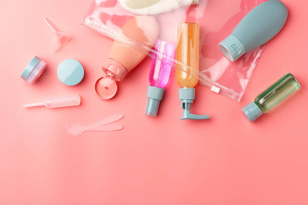 istock Clear Plastic Bag Containing Travel-Sized Toiletries on Pink Background 2167514686