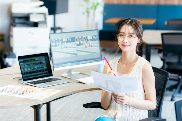 istock business woman working in the office 2167516536