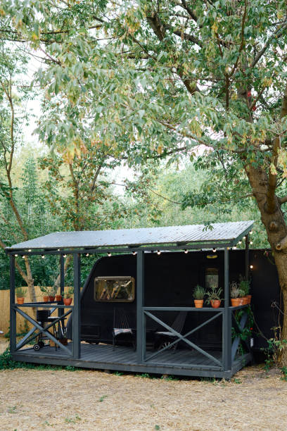 istock cozy camping van in a lush forest 2167517792