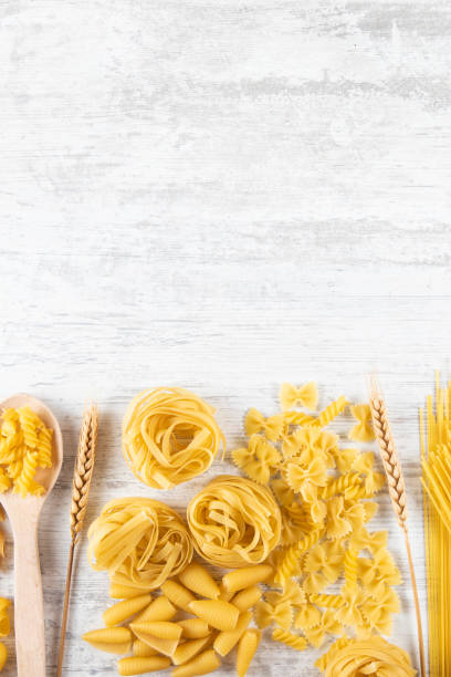 istock Italian Pasta on Rustic Wooden Table 2167518532