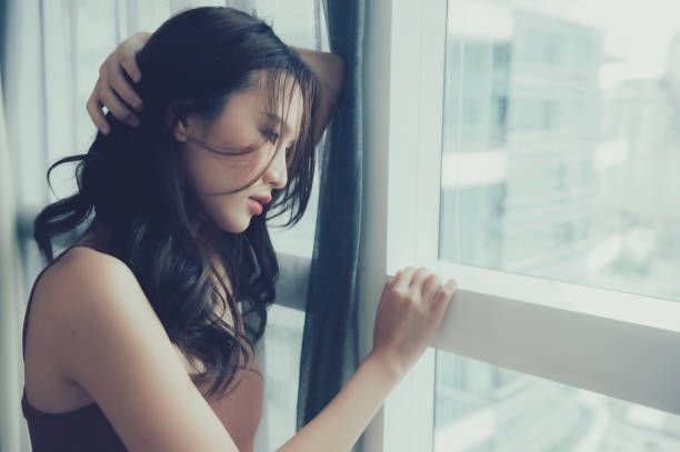 istock Asian woman at home 2167518592