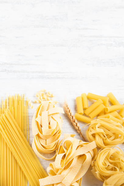 istock Italian Pasta on Rustic Wooden Table 2167518734
