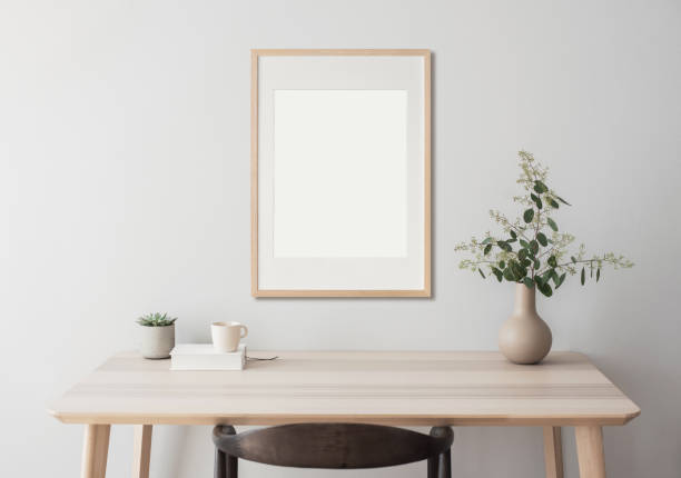 istock Frame artwork mockup in interior design. Blank picture frame on a wall. Vertical orientation 2167519007