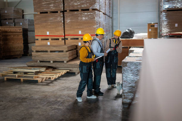 istock Factory inspectors working in a warehouse 2167521584