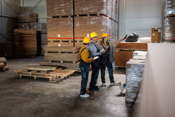 istock Factory inspectors working in a warehouse 2167521589