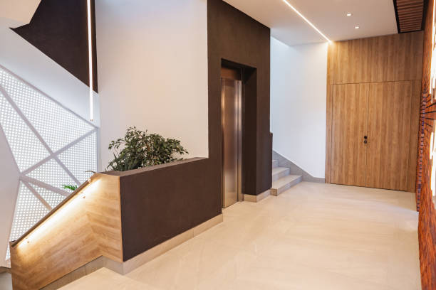 istock Interior of a building corridor with stairs and elevator 2167522218