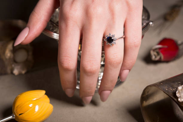 istock Woman hand with jewels 2167523699