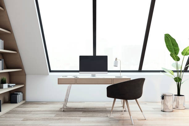 istock Modern home office with wooden desk and large window. 3D Rendering 2167525867
